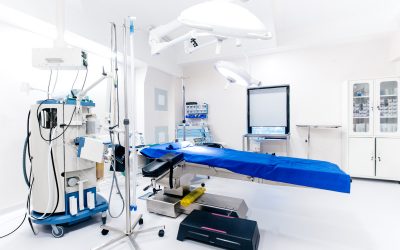 Hospital interior with operating surgery table, lamps and ultra modern devices, technology in modern hospital